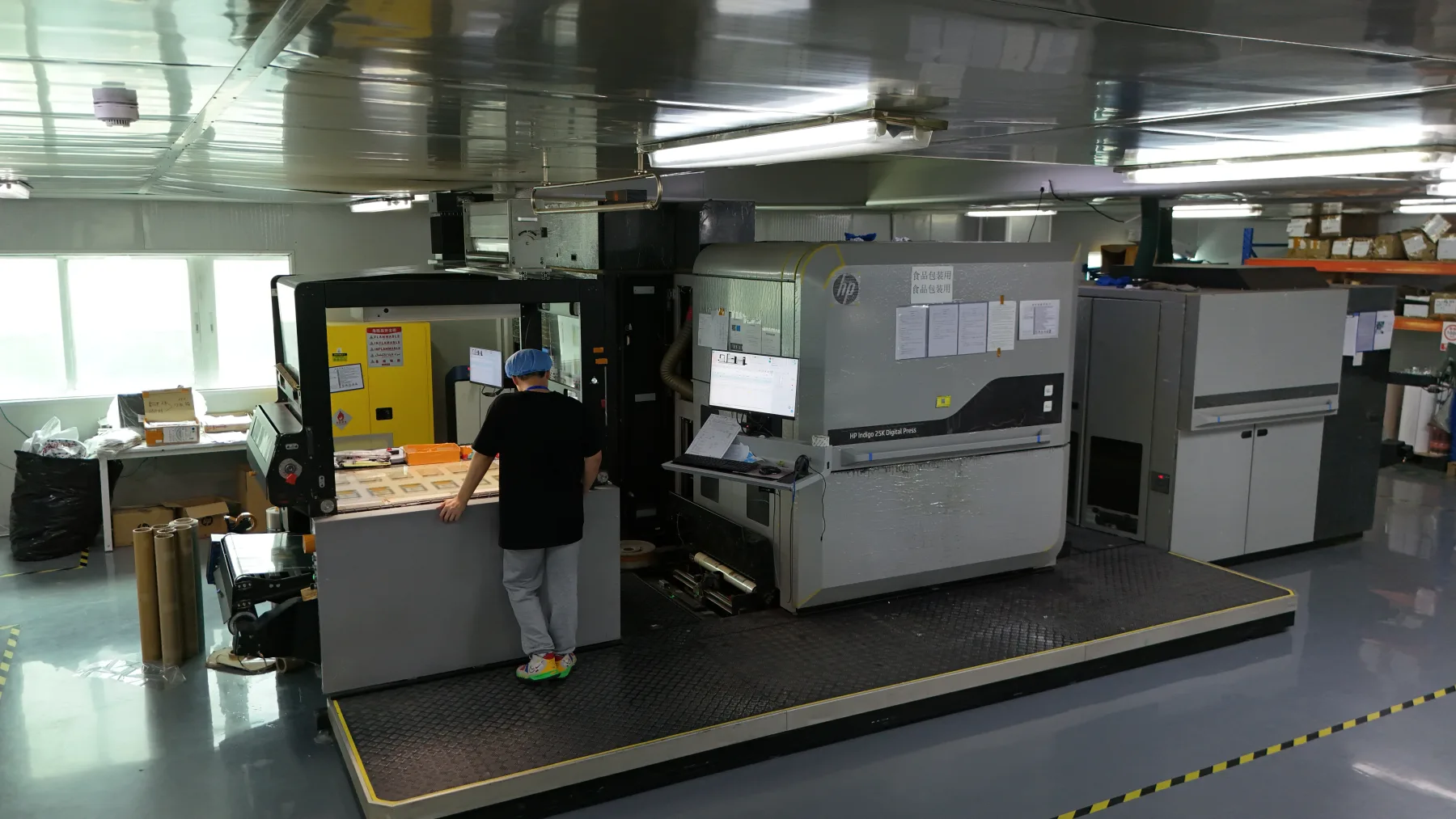 Digital pouch printing equipment in the Unique Packaging workshop