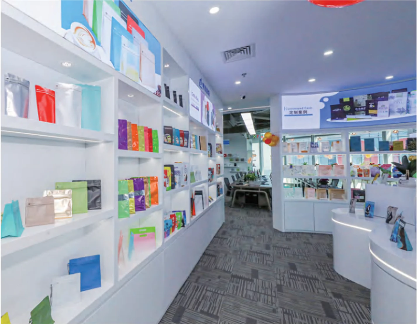 Aisle view with flexible packaging samples on illuminated shelves